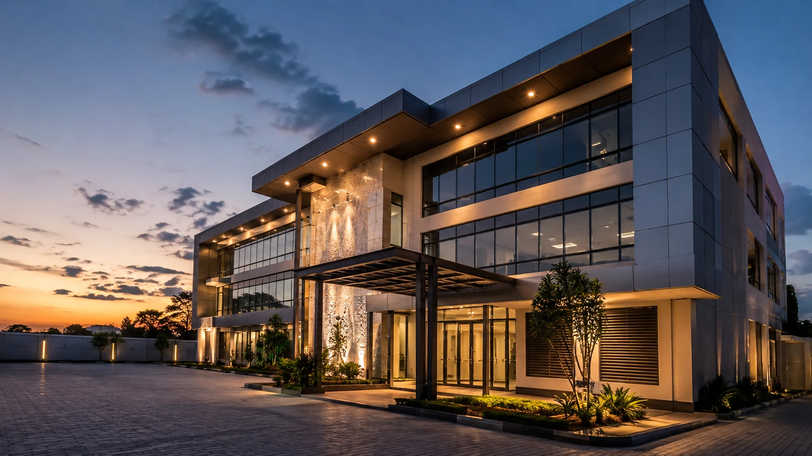 Contemporary commercial development illuminated at dusk
